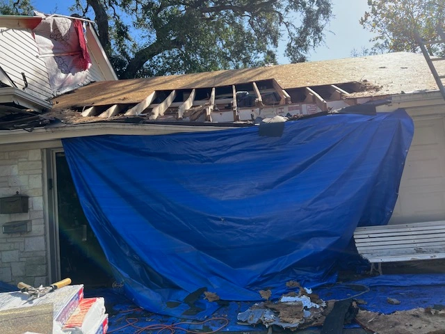 Bottom left image of roof damage